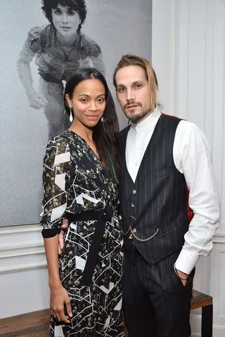 A Creative Couple - Zoe Saldana and her photographer hubby Marco Perego make a striking pair at The Art of Elysium Celebrates the Work of Jared Lehr at The Talmadge in Los Angeles.(Photo: Araya Diaz/Getty Images for The Art of Elysium)