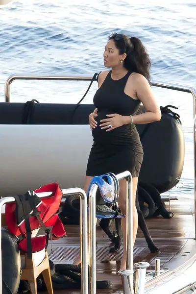 Holiday in Style - Former model and fashion mogul&nbsp;Kimora Lee Simons, who is pregnant with her fourth child, rubs her belly while enjoying her annual holiday in St. Barth with her former husband Russell Simmons and their kids.&nbsp;(Photo: PacificCoastNews)