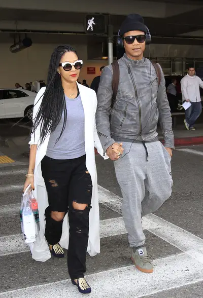 P.D.A. - Tia Mowry and husband&nbsp;Cory Hardrict,&nbsp;who co-stars alongside Bradley Cooper in this month's new film&nbsp;American Sniper, hold hands as they exit LAX Airport in Los Angeles.&nbsp;(Photo: Sharky / Splash News)