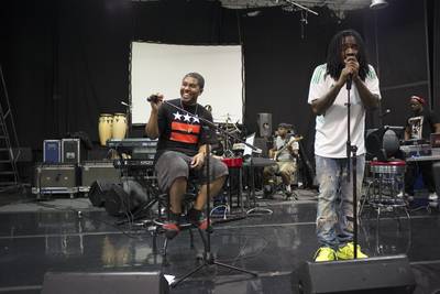Wale and Tre Johnson - Formerly the frontman for acclaimed go-go band Uncalled 4 Band, Tre (left) can be found supporting his best bud by singing lead vocals when Wale travels.   (Photo: Marvin Joseph/The Washington Post)
