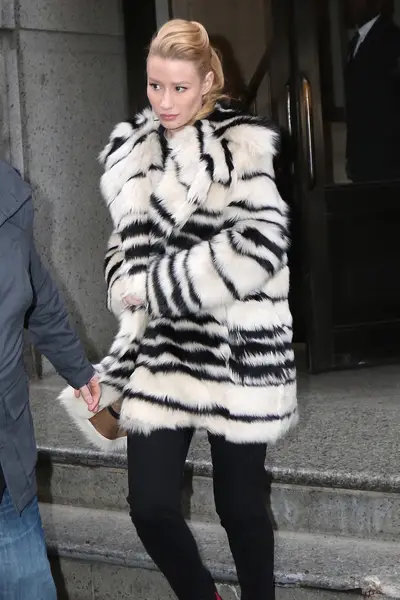 Winter Fur - Iggy Azalea&nbsp;channels Cruella de Vil in this black-and-white-striped fur coat out in New York City.&nbsp;(Photo: &nbsp;PacificCoastNews)