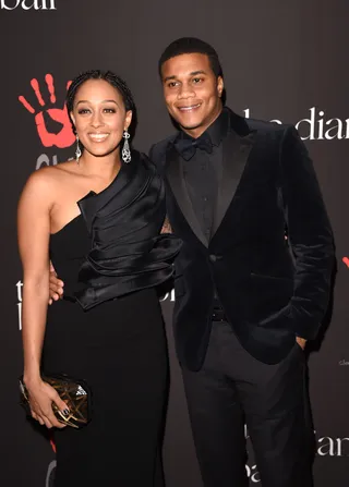His and Hers - Tia Mowry (in Edward Arsouni) and husband Cory Hardrict make it a color coordinated date night on the red carpet. P.S. Tia is killing it in that dress!&nbsp;(Photo: Jason Merritt/Getty Images)