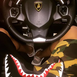 Holla at Me  - "A n***a beep beep and shawty toot, toot!/Blowing out there brains, car need a new roof/Looking like a superstar when I roll through"&nbsp;(Photo: Chris Brown via Instagram)