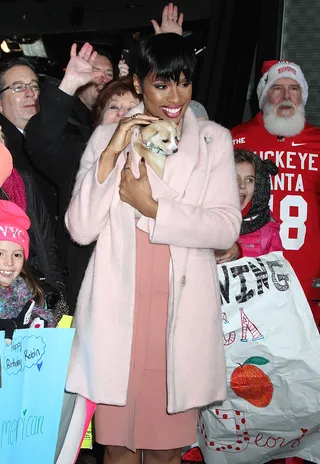 Puppy Love - Jennifer Hudson cuddles with a cute tea cup pup on a cold NYC morning in Times Square before heading to film a segment on Good Morning America.(Photo: Fortunata / Splash News)