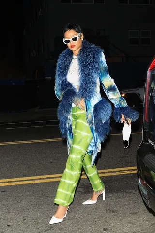 Bad Gal! - Rihanna is back on Instagram donning a new haircut. Bad gal is back on Instagram wearing a blue jacket and a lime green pants. We are loving are new look!