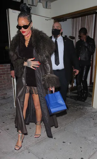 Date Night! - Rihanna was spotted at Delilah in Los Angeles rocking a little brown vintage Fendi dress. She was on a date with her rumored boo, A$AP Rocky. She wore a vintage Fendi coat, with Fenty x Amina Muaddi heels. We are loving her look! Photo: ShotbyNYP / BACKGRID