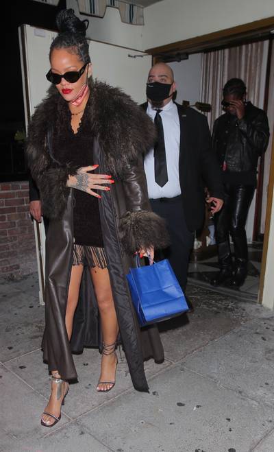 Date Night! - Rihanna was spotted at Delilah in Los Angeles rocking a little brown vintage Fendi dress. She was on a date with her rumored boo, A$AP Rocky. She wore a vintage Fendi coat, with Fenty x Amina Muaddi heels. We are loving her look! Photo: ShotbyNYP / BACKGRID