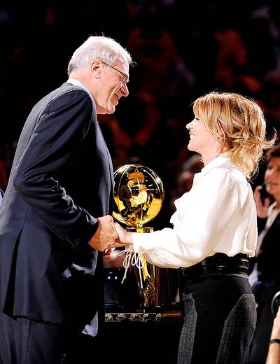 NBA Addresses Phil Jackson and Jeanie Buss' Relationship - The NBA has put parameters in place to make sure the high-profile relationship between Jeanie Buss, president of the Lakers, and Phil Jackson doesn?t create issues of impropriety. &quot;To avoid even the appearance of a conflict,? the NBA addressed both teams to ensure that their relationship will not affect how the teams operate. Jackson and Buss got in engaged in 2012 and have been dating since 1999.&nbsp;(Photo: Kevork Djansezian/Getty Images)