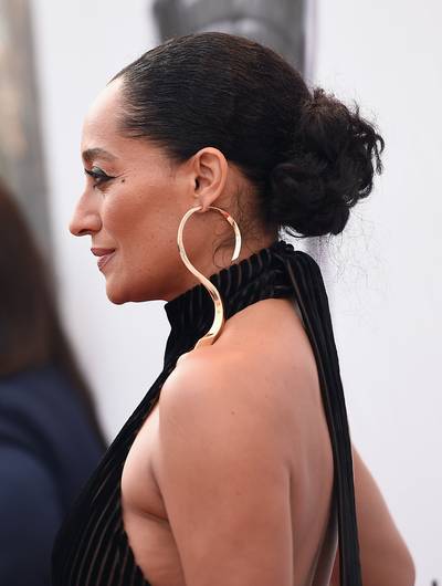 2017:&nbsp;Bun Realness - Ross always has a way of making the simplest of buns look so elegant and intentional. Just take 2017 for instance, where her tousled bun served as the perfect addition to her chic and understated attire. (Photo by Alberto E. Rodriguez/Getty Images for NAACP Image Awards)