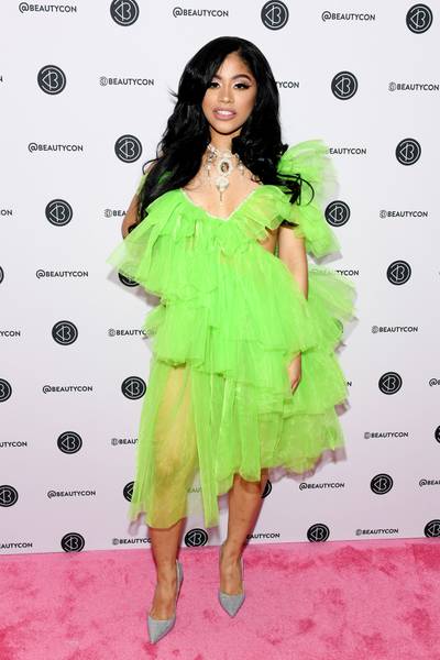 Bronx Babe At BeautyCon - Ok, Hennessy! Cardi B's little sis wore a money-inspired look to hit the BeautyCon main stage to discuss their family's money moves. The Bronx-bred beauty was seen alongside Cardi in a neon green,&nbsp;$295, Laurence and Chico, asymmetrical, tulle dress. (Photo: Noam Galai/Getty Images for Beautycon)&nbsp;