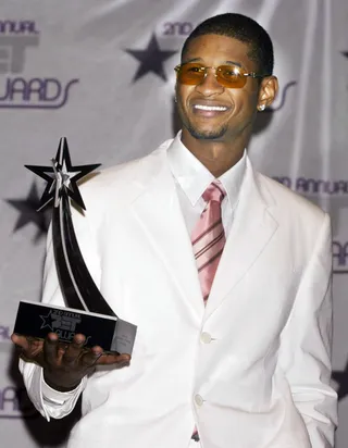 Such a Good Artist - Usher recently reminded us why he's the king with new single, &quot;Good Kisser,&quot; but we've got the receipts. Here, he takes a photo with his award for Best Male R&amp;B Artist at the second BET Awards. Do him a favor and don't call it a comeback!(Photo: REUTERS/Fred Prouser /Landov)