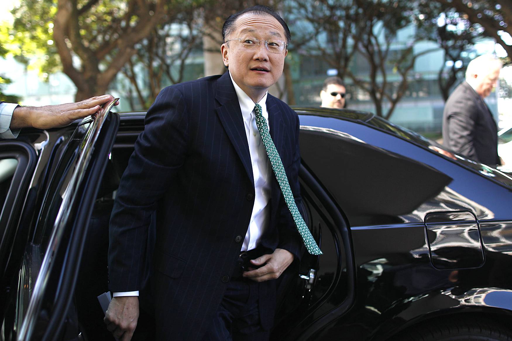 American Jim Yong Kim to Lead World Bank - The 52-year-old health expert Jim Yong Kim was chosen by the World Bank's board Monday to serve as the organization's next president, beating out the developing world’s favorite, Nigerian finance minister Ngozi Okonjo-Iweala. Okonjo-Iweala’s candidacy marked the first time a non-American was considered for the post. Days prior to the decision, former Colombian finance minister Jose Antonio Ocampo dropped his candidacy for the post, calling the race a “political exercise.”\r(Photo: REUTERS/Ueslei Marcelino)