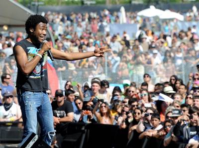 Kidding Around - Rapper, comedian and writer Donald Glover, known by fans of his music as Childish Gambino, brought out Kendrick Lamar during his set which included performances of his songs &quot;Heartbeat&quot; and Bonfire.&quot;(Photo: Kevin Winter/Getty Images)