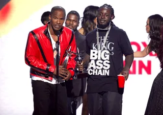 Jamie Foxx and T-Pain - The host, still wearing his Michael Jackson tribute jacket and the Tallahassee rapper accept their Best Collaboration award for the mega-hit "Blame It."&nbsp;(Photo: Vince Bucci/PictureGroup)