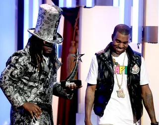T-Pain and Kanye West - The rappers-producers accept the Best Collaboration award. (Photo: Kevin Winter/Getty Images)