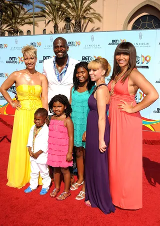 Terry Crews, wife Rebecca Crews and Their Children - The hilarious actor and star of BET reality show The Family Crews arrives with his stylish family for the big event. (Photo: Frazer Harrison/Getty Images)