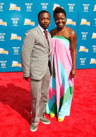 Anthony Hamilton and Wife - The R&amp;B crooner keeps it simple while allowing his wife Tarsha to glow in a summer-perfect dress.&nbsp;(Photo: Frazer Harrison/Getty Images)
