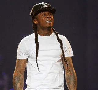 'How to Hate'&nbsp; - What's love without hate? This companion piece to "How to Love" shows a vengeful Weezy and his auto-tune idol, T-Pain, lashing out after having their hearts broken.(Photo: Jeff Daly/PictureGroup)&nbsp;