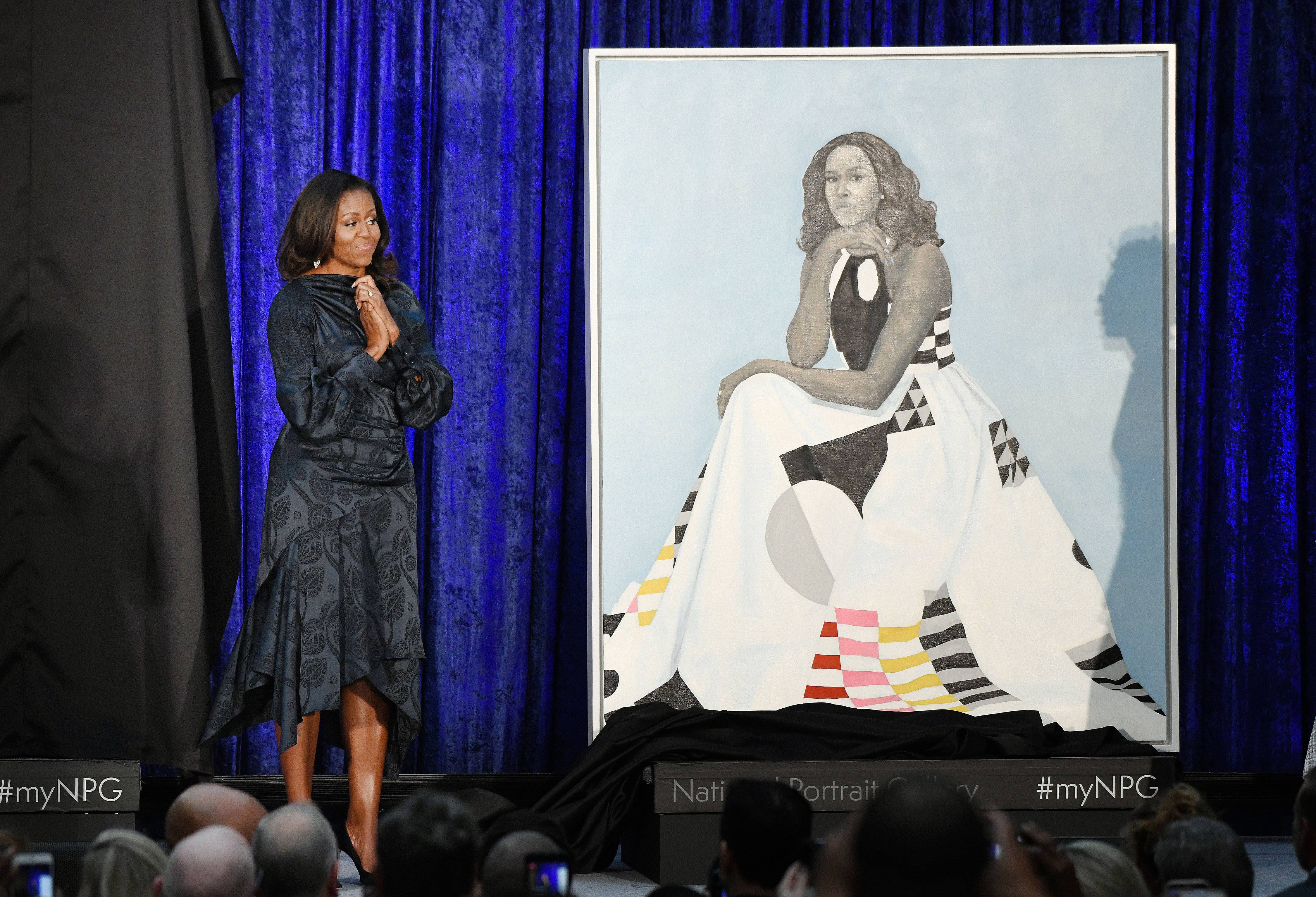 Former First Lady Michelle Obama unveils her official portrait at the National Portrait Gallery , February 12, 2018 in Washington, DC. Photo by Olivier Douliery/Abaca Press(Sipa via AP Images)