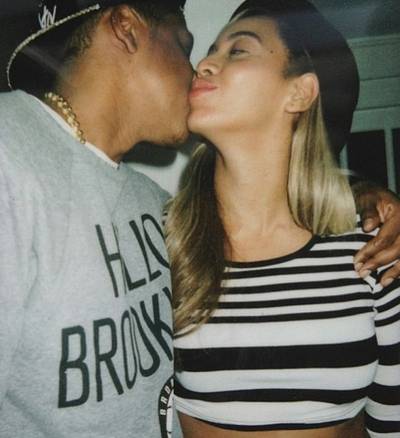 Beyonce @badibey - Hip Hop's favorite couple! Bey shares a pic of a little PDA between her and Jay-Z. (Photo: Instagram via Beyonce)