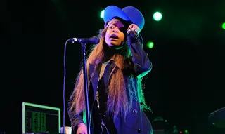 Rain? What rain? - June 7, 2013 - Not one to let a little shower shake her, Erykah Badu serenaded the soaked crowd at the 2013 Governors Ball which also boasted performances from Kanye West, Kendrick Lamar and Nas.(Photo: Brad Barket/Getty Images for SKYY Vodka)