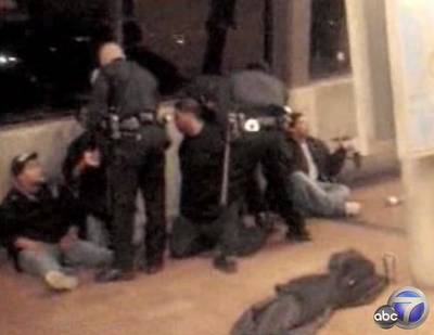 Captured on Video - The horrific shooting was captured with cellphone cameras&nbsp;by bystanders watching the events unfold, and many uploaded the content online. In some angles, Grant can be seen sitting against a wall, and later holding his hands in the air as he speaks to officers. Videos also captured Grant being hit by an officer, who claimed he was resisting arrest, before being forced to the ground. (Photo: Courtesy of ABC7)