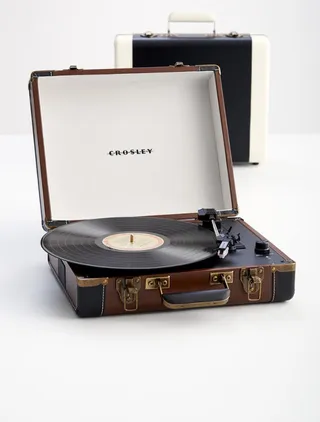 Portable Turntable and MP3 Audio System - Bring back a sense of nostalgia and mix modern vintage with this must-have for dad. He can take his old vinyl records for a spin or use the speakers to connect to an mp3 player.   (Photo: Red Envelope)