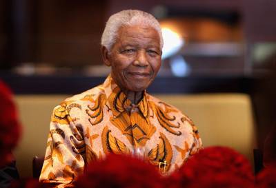 Nelson Mandela - President George Bush awarded former South African president and apartheid freedom fighter Nelson Mandela the Presidential Medal of Freedom in 2002.(Photo: Chris Jackson/Getty Images)