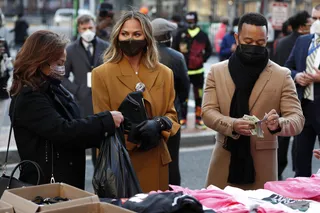 Chrissy Teigen And John Legend - Chrissy Teigen&nbsp;and&nbsp;John Legend&nbsp;were spotted shopping for souvenirs during the 59th Presidential Inauguration. In the paparazzi photo, the couple seemed to be in good spirits as they purchased a few pieces of memorabilia honoring President&nbsp;Joe Biden&nbsp;and Vice President&nbsp;Kamala Harris.&nbsp;&nbsp;The&nbsp;All Of Me&nbsp;singer, who performed at the Inauguration Concert Wednesday evening, even purchased his mother-in-law&nbsp;Vilailuck 'Thai Pepper' Teigen&nbsp;a pink 'Biden-Harris 2020 Restore the Soul of America' t-shirt. How thoughtful!&nbsp;&nbsp; ASSOCIATED PRESS