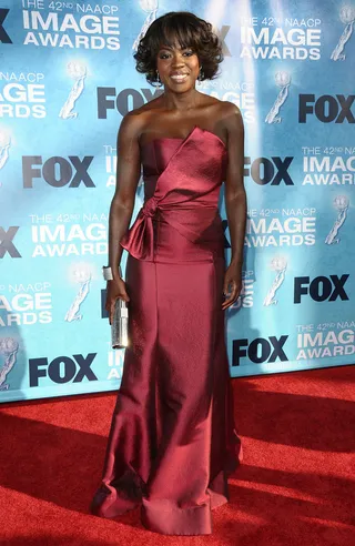 2011: Flawless In A Maroon Metallic Gown - (Photo by Jason LaVeris/Getty Images)