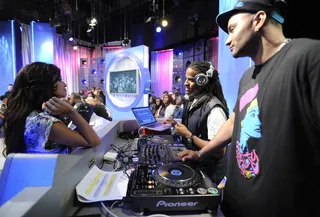 Play My Song - Rocsi Diaz talks with and DJ Lyve during commercial break at 106 &amp; Park, May 11, 2012. (Photo: John Ricard / BET)