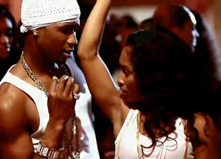 Usher and Chilli in "U Got It Bad" - Oh how the rumors ran rampant when it came to Usher and Chilli's relationship, fueled even more by Usher's video for this 2001 single, which featured "Sexy" playing the role of the ex-girlfriend he's jonesin' for.(Photo: Courtesy Arista Records)