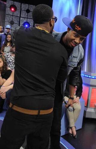 Holla Back - Omarion says goodbye to Terrence J at 106 &amp; Park, May 2, 2012. (Photo: John Ricard/BET)