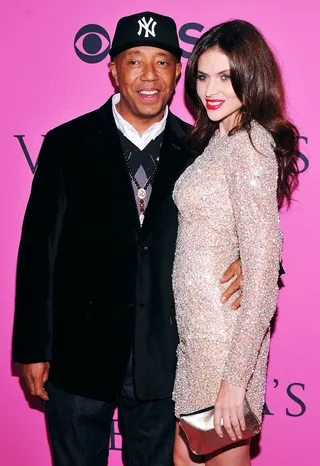 Model Man - Russell Simmons attended the show with Hana Nitsche. He never misses a show or a chance to take a photo with a beautiful woman. (Photo: Stephen Lovekin/Getty Images)