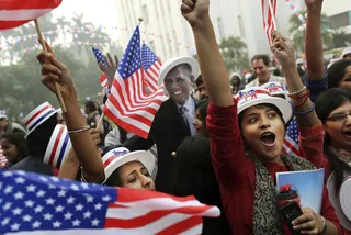New Delhi - Indian students cheered after Obama was projected as the winner of the election Tuesday night. (Photo: AP Photo/Kevin Frayer)