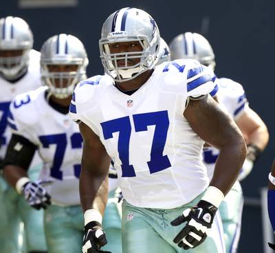 Cowboys, Tyron Smith Agree to $98 Million Extension - The Dallas Cowboys just sewed up long term protection for Tony Romo,&nbsp;and whoever plays quarterback thereafter, by signing left tackle Tyron Smith&nbsp;to an eight-year, $98 million deal on Wednesday. The Pro Bowl Smith, 23, was entering the final year of his contract.&nbsp;(Photo: Stephen Brashear/Getty Images)
