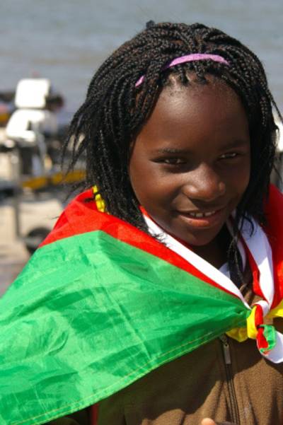 Mozambican Teen Sailing Toward Success - Maria Mabjaia, a 14-year-old from Mozambique, has discovered a world-class knack for sailing.She won the bronze medal in the women's laser radial sailing event at the All-Africa Games last year, and has subsequently won a national sports award.(Photo: Courtesy ISAF World Sailing)
