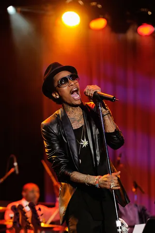 Wiz Khalifa - Breaking news: Wiz Khalifa smokes a whole lot of weed. The Pittsburgh rapper was arrested leaving a show in North Carolina when police found 60 grams of marijuana on his tour bus. Black and yellow...and green.  (Photo: Larry Busacca/Getty Images)