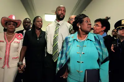 &quot;This Issue Won't Go Away&quot; - Reps. Frederica Wilson and Sheila Jackson Lee escort Trayvon's parents to a press conference after the congressional briefing. &quot;There is no doubt that there was a failed investigation,&quot; Jackson Lee said. &quot;The importance of this is that the statement is made that this is an issue that will not go away.&quot;(Photo: Chip Somodevilla/Getty Images)