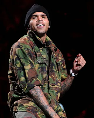 Army Fatigue Swaggin' - Besides being one of the baddest dudes in the R&amp;B game, Chris Brown has also become someone to look at when it comes to fashion. Peep his army fatigues in this one.(Photo: C Flanigan/WireImage/Getty Images)