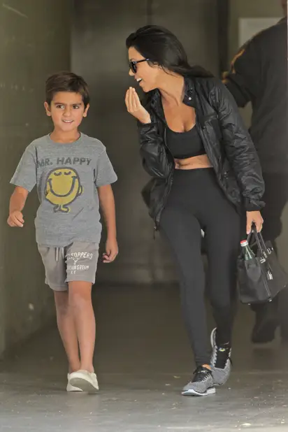 Kourtney Kardashian attempts incognito with son Mason