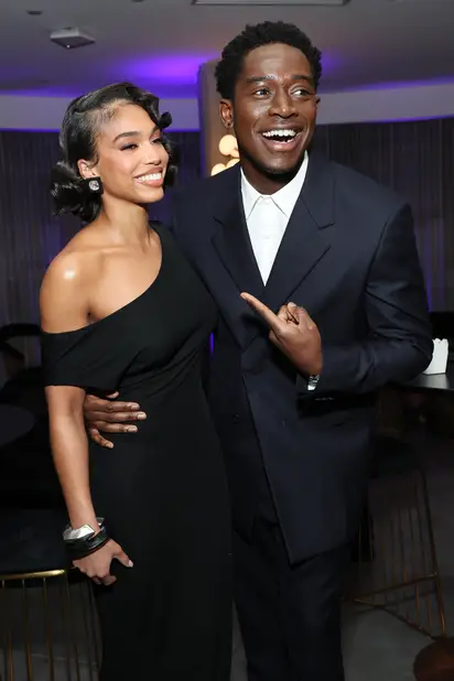 Earvin Magic Johnson and son Andre Johnson at the This Christmas, WireImage