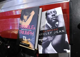 The Audience Receives Two Books - Audience members all received 2 books tonight, T.I.'s "Trouble &amp; Triumhp" and Wyclef Jean's "Purpose" at 106 &amp; Park, September 17, 2012. (Photo: John Ricard / BET).