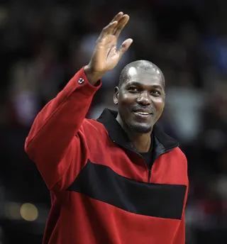 The Knicks Hire Hakeem Olajuwon - Basketball Hall of Famer Hakeem Olajuwon has a new gig with the New York Knicks. He will be whipping the stressed team into shape at his Texas home this summer.  (Photo: Bob Levey/Getty Images)