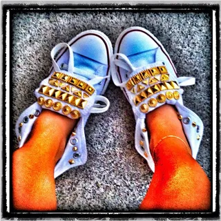 Adrienne Bailon&nbsp; - “I stayed COOL in my Custom Chucks by @freshisad Today!!! #NYC #HeatWave #Converse.”  (Photo: Instagram)