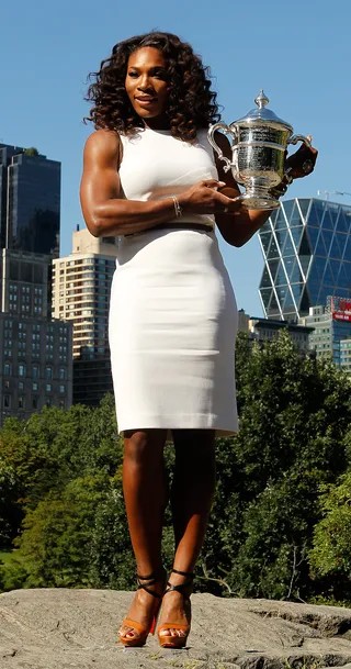 Serena Williams - The U.S. Open champ scores in the style department in her all-white sheath and Louboutin sandals.  (Photo: Mike Stobe/Getty Images)