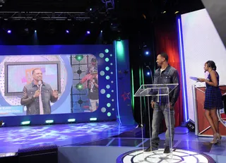Aww Yeah - Mike Epps checks the playback of his opening segment at the BET Hip Hop Awards Nominations announcements at 106 &amp; Park, September 12, 2012. (Photo: John Ricard / BET)