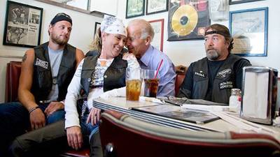 Joe Being Joe - Don't believe your eyes! This biker woman only looks like she's sitting on the lap of Vice President Joe Biden during a September stop at Cruisers Diner in Seaman, Ohio.  (Photo: AP Photo/Carolyn Kaster)