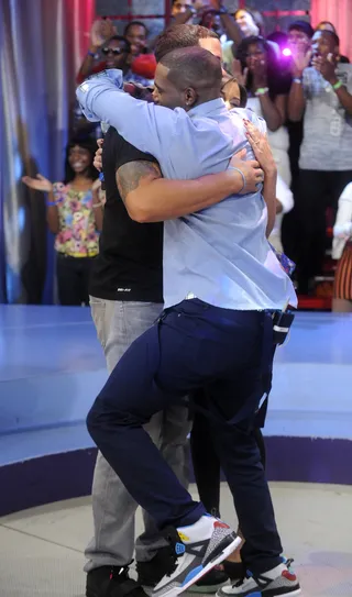 Hugs - Kevin Thompson and Angel Lenise give Deron Williams a very warm welcome at 106 &amp; Park, September 10, 2012. (Photo: John Ricard / BET)