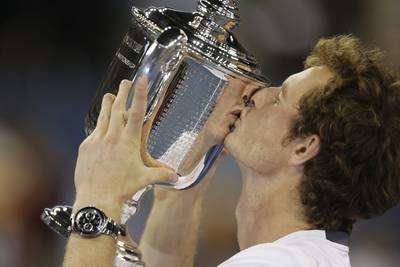 Finally! - Andy Murray won his first Grand Slam Monday, defeating defending champion Djokovic 7-6 (10), 7-5, 2-6, 3-6, 6-2 in a match that lasted almost five hours. He is the first British man to win a Slam since Fred Perry won Wimbledon and the U.S. Championships in 1936.(Photo: AP Photo/Charles Krupa)